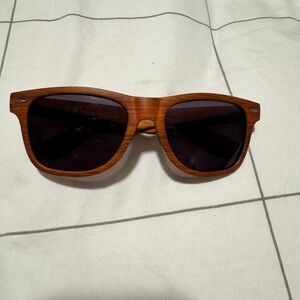 Brown Wooden Sunglasses with Dark Lenses from Tito’s Vodka